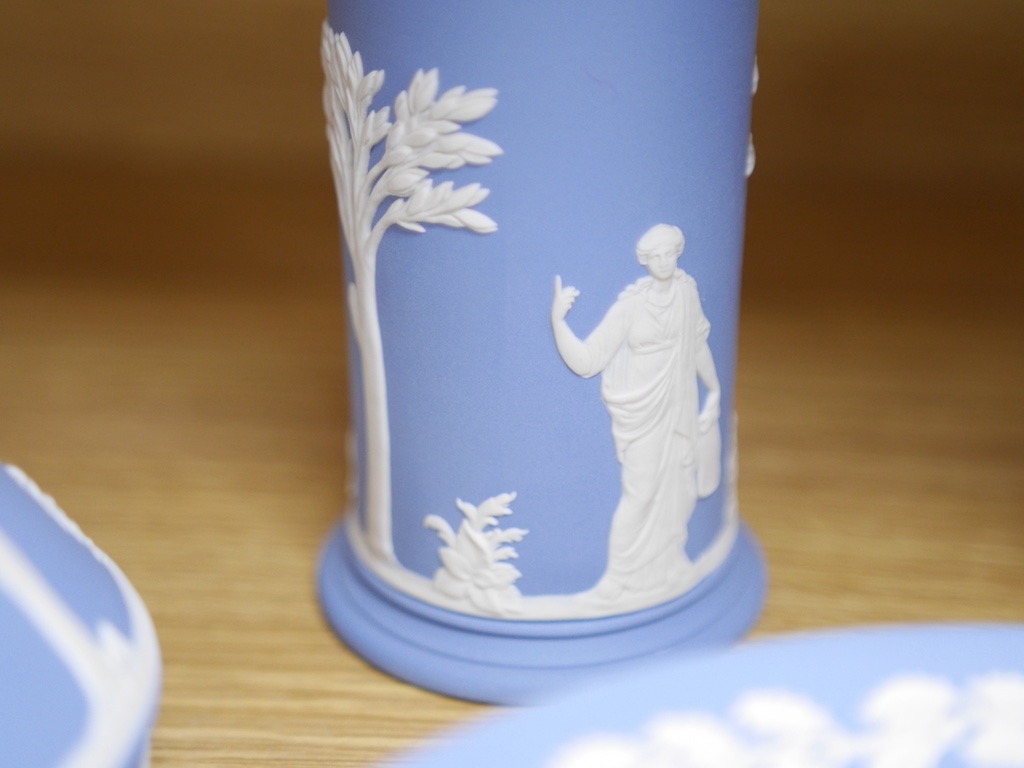 Group of Wedgwood jasper ware to include a pair of vases and a set of eight Christmas plates, largest 21cm in diameter. Condition - good